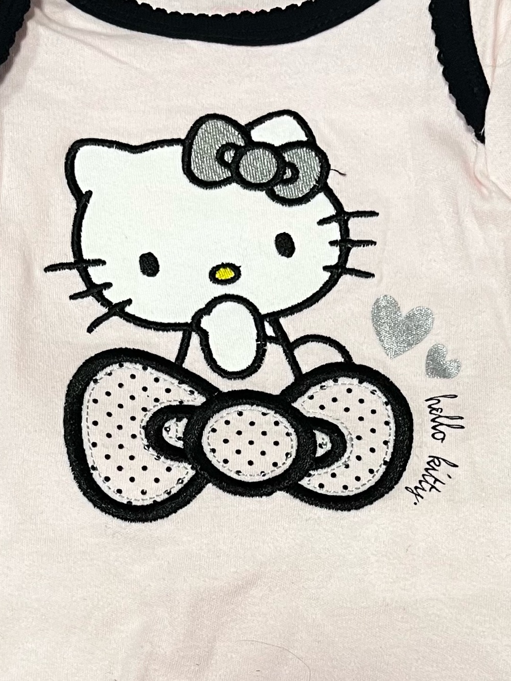 Hello Kitty Pink Bodysuit with Black Trim and Silver Accents